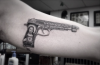 g-dragon-gun-tattoo-tybalt.png