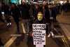 35305658-8918843-Many_of_the_demonstrators_carried_placards_one_of_which_read_No_-a-34_1604606...jpg