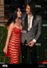 actor-russell-brand-and-musician-katy-perry-arrive-at-the-vanity-fair-D52P91.jpg