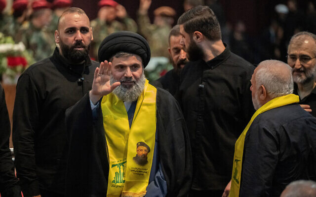 Senior Hezbollah official Hashem Safieddine (C) attends the funeral ceremony of slain top commander Fuad Shukr in Beirut's southern suburbs on August 1, 2024. (Khaled Desouki/AFP)